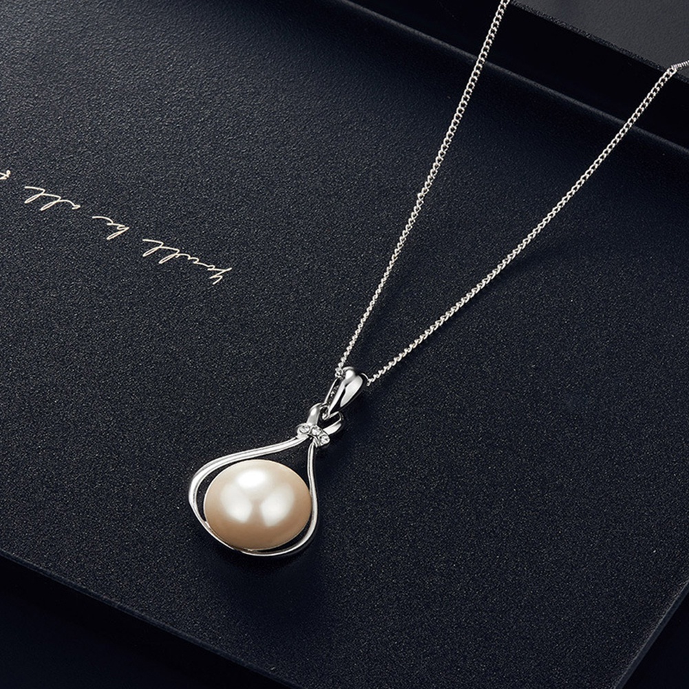 Bộ Vòng cổ + bông tai hình giọt nước đính ngọc trai giả