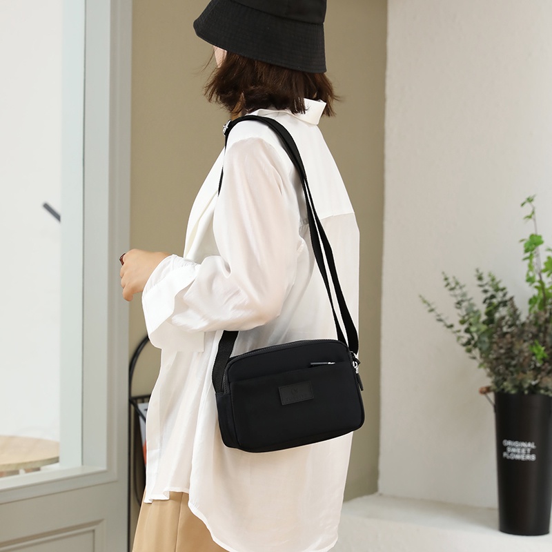 Ba Lô Vải Nylon Màu Sắc Macaron Thiết Kế Đơn Giản Sức Chứa Lớn Cho Nữ