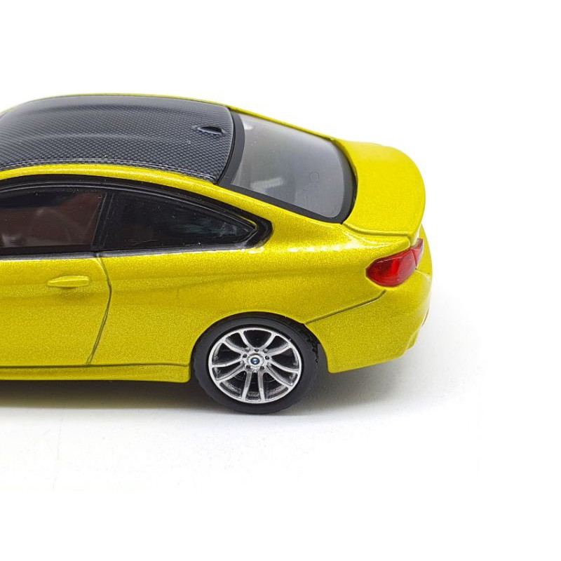 Xe Mô Hình BMW M4  Austin Yellow Metalic LHD 1:64 Mini GT