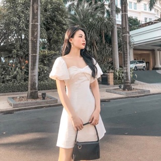 Đầm trắng tay phồng nơ ngực siêu xinh