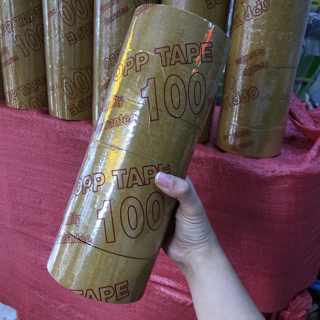 Băng keo vàng đục 4,8cm-200yard lõi 3.5li để đóng hàng 1,2kg 6 cuộn giá sỉ