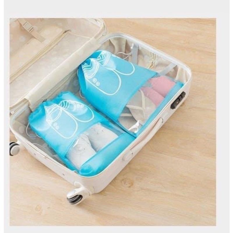 Túo chống bụi du lịch