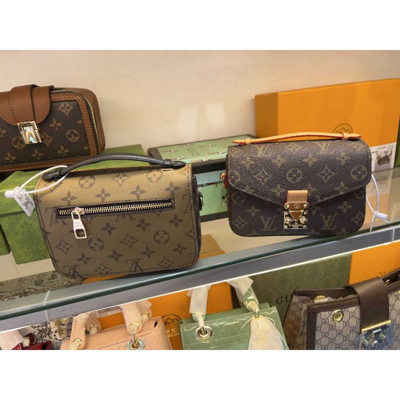 Túi xách tay đeo chéo metis