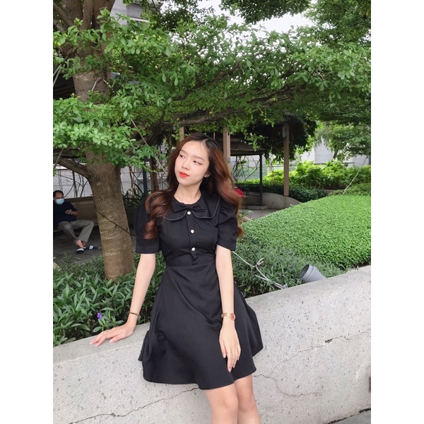 Đầm nơ viền chỉ