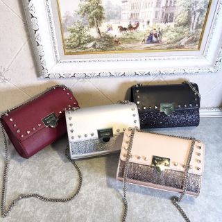 Túi nhũ đinh Charles & Keith  diện Tết