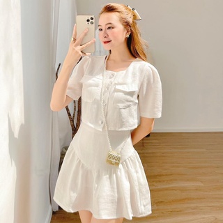 Set áo lửng đính nút và chân váy trắng