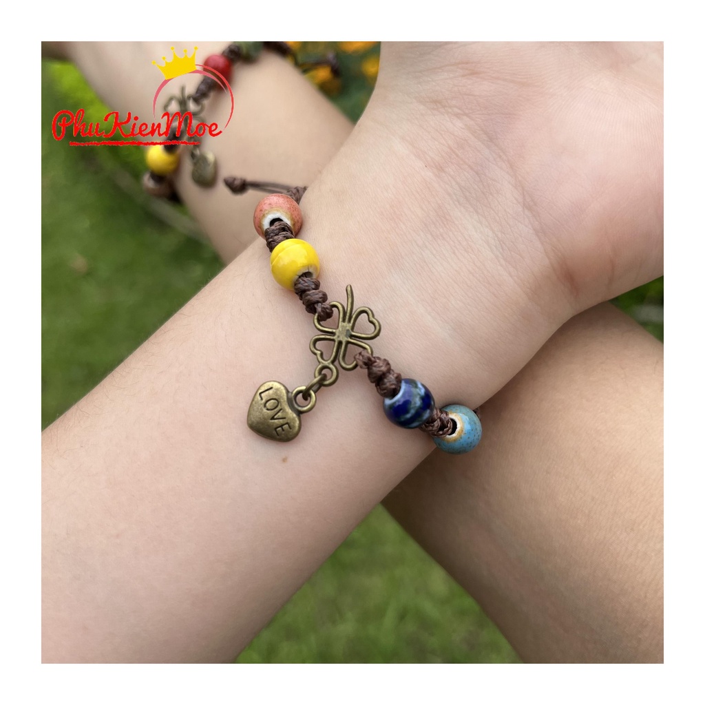 Vòng tay dây rút hạt thổ cẩm hình chiếc lá may mắn gắn tim handmade PhuKienMoe