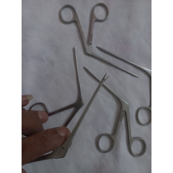 Dụng cụ gấp di vật tai mũi họng.d.i.g.GENMANY Pakistan Chất liệu : Thép Thước : đầu 12.cm .,14cm