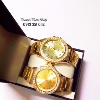 Đồng hồ kim loại vàng