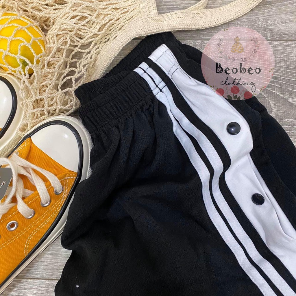 Quần culottes thun đen viền trắng phối nút bấm xẻ ulzzang