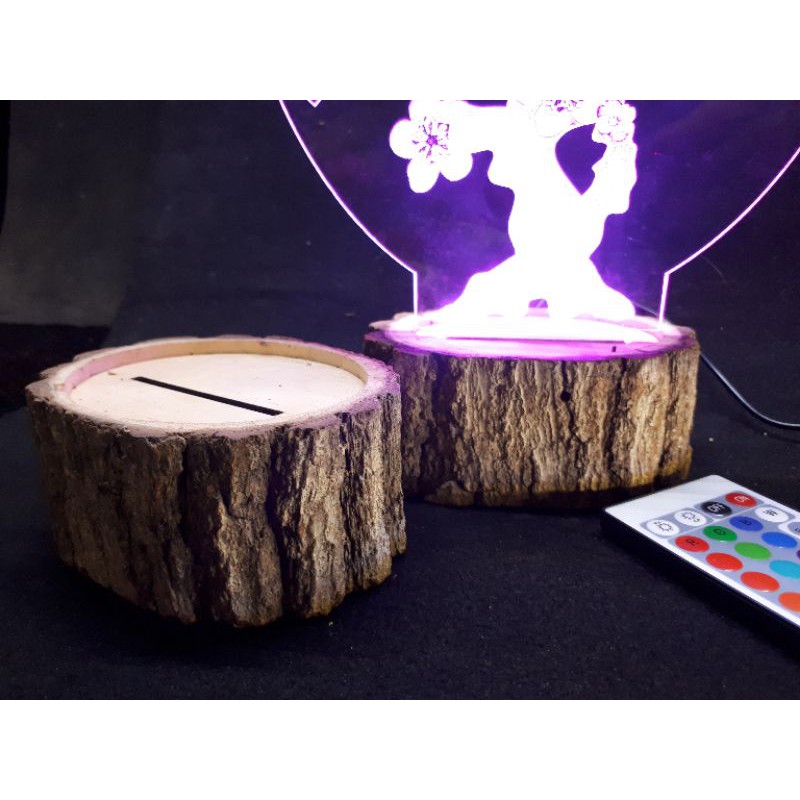 Đèn led cây Mai đế gỗ vỏ tròn.