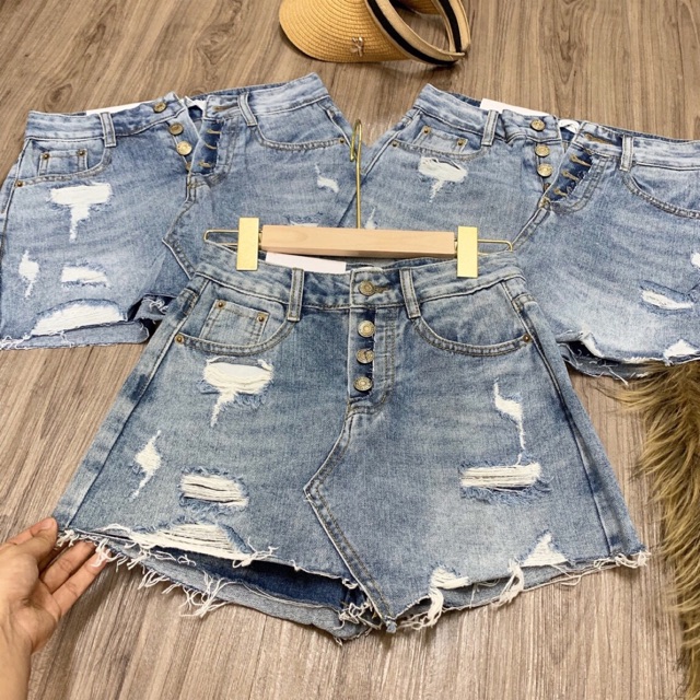 Quần bò giả váy Qc