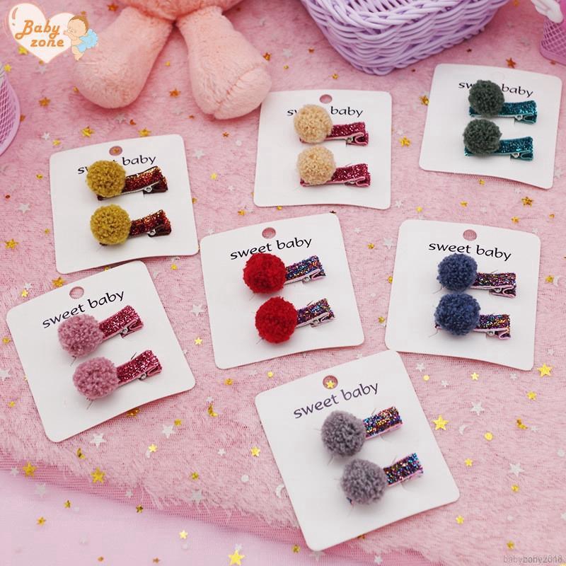 Set 2 kẹp tóc gắn quả cầu lông xinh xắn thời trang cho bé gái