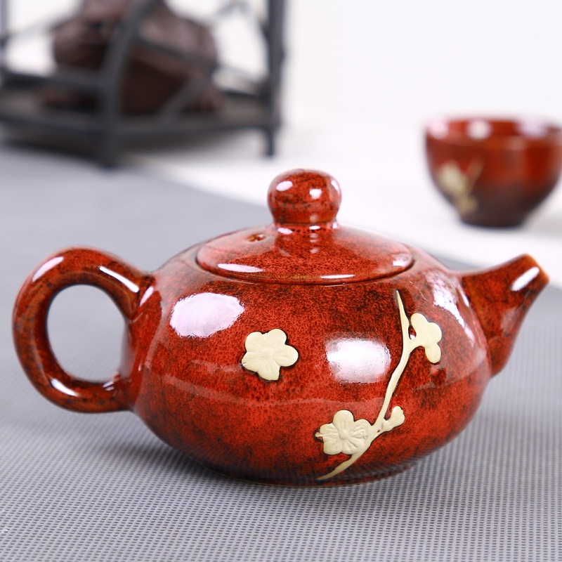 Bộ ấm trà gốm sứ tráng men cao cấp gồm 1 ấm pha trà + bộ chén lọc trà + 6 chén Kèm hộp quà tặng