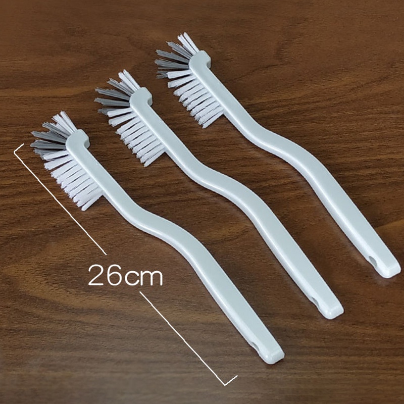 1 bàn chải vệ sinh cốc nước hình cá