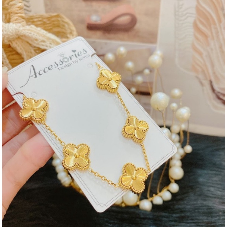 Lắc Tay Titan Ko Han Rỉ Cỏ 4 Lá TT 4004