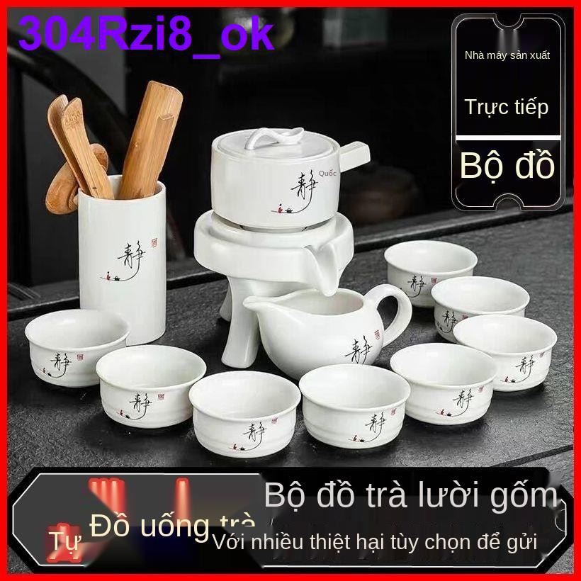Bộ ấm trà Kung Fu bán tự động đồ gốm gia dụng Lười đá mài Uống đạo tách đơn giản