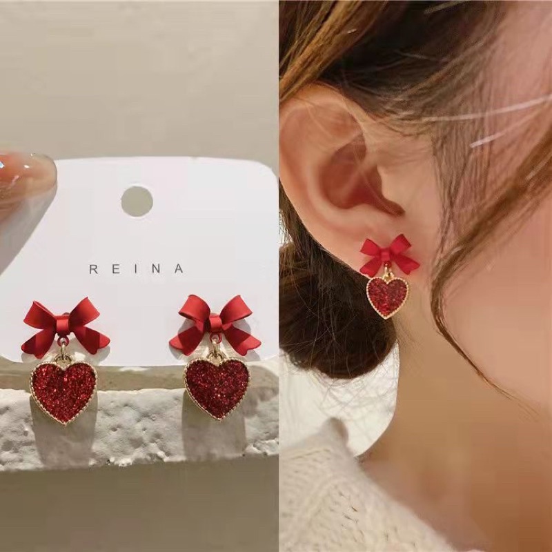 Bông tai nữ trái tim nơ k551 mayconner
