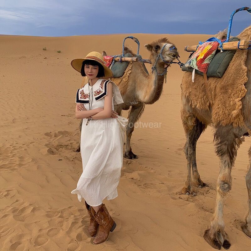 Boots cao bồi phong cách du mục hoa văn tinh tế chất da da bò đep thu đông 2022