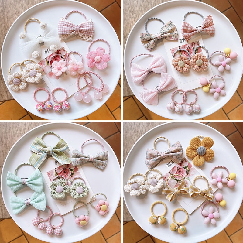 Set 10 Dây Buộc Tóc Co Giãn Phối Ren Hoa Hoạ Tiết Hoạt Hình Thời Trang Dễ Thương Cho Bé Gái