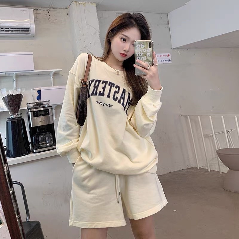 Set Thể Thao Họa Tiết Chữ Chất Liệu Vải Nỉ Co Dãn Thấm Hút Mồ Hôi Màu Kem Cho Nữ