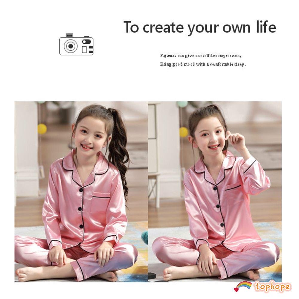 Bộ pijama bằng lụa satin tay dài dùng cho trẻ nhỏ