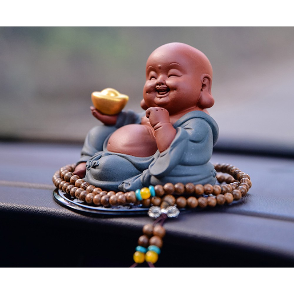 Tượng Phật Di Lặc ngồi thư thái cầm đỉnh vàng - gốm tử sa