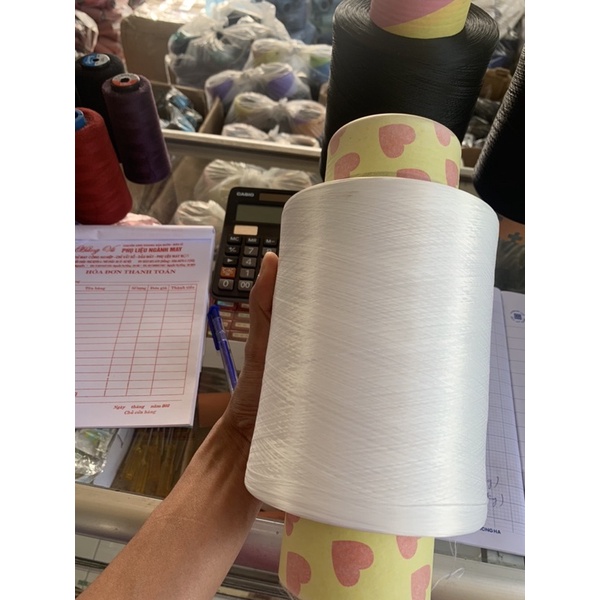 Tơ vắt sổ ống 1kg sợi chuẩn Hualon AW