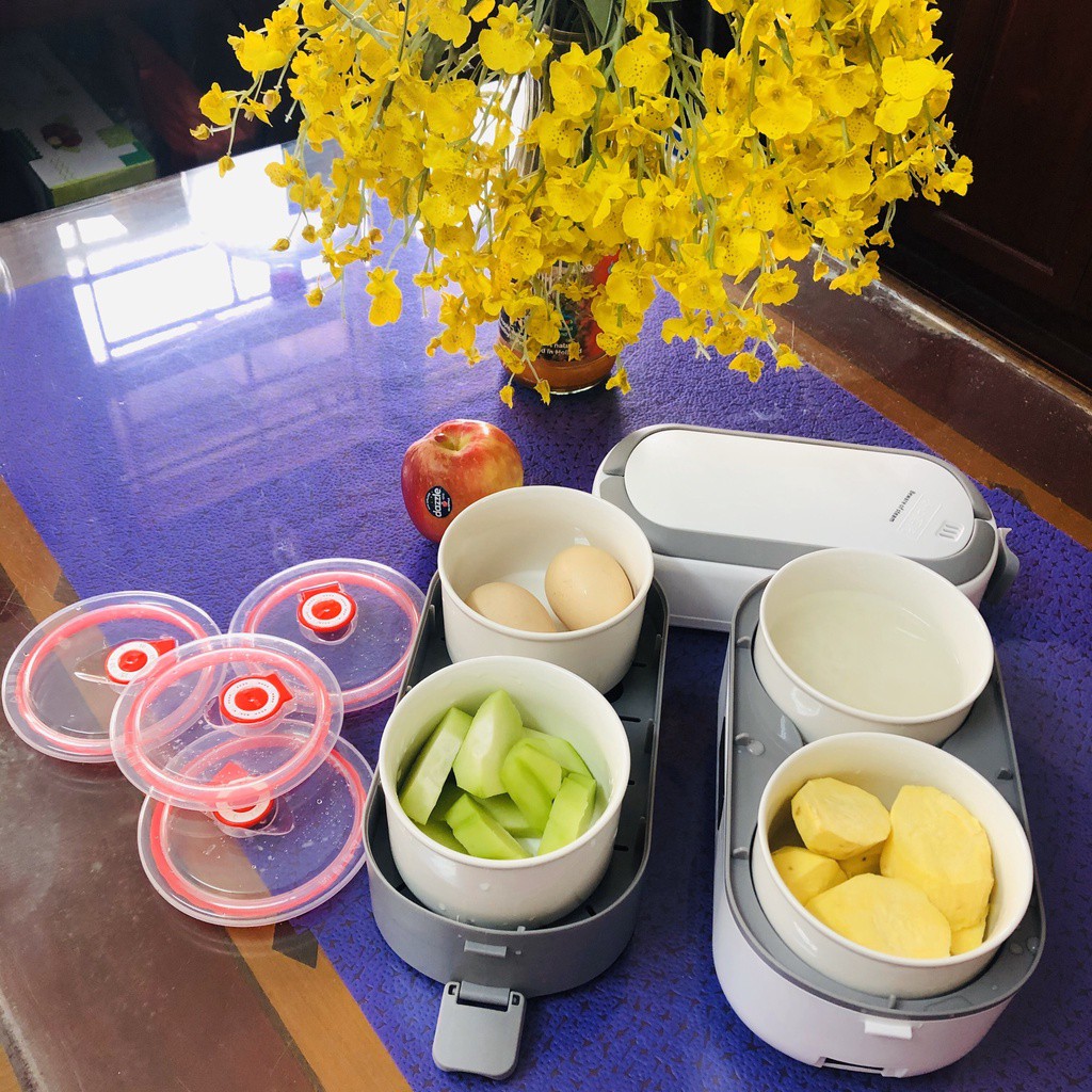 Bát sứ của hộp cơm hấp nóng Song Anh