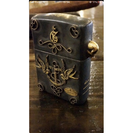 Dung dịch giả cổ trên Zippo đồng