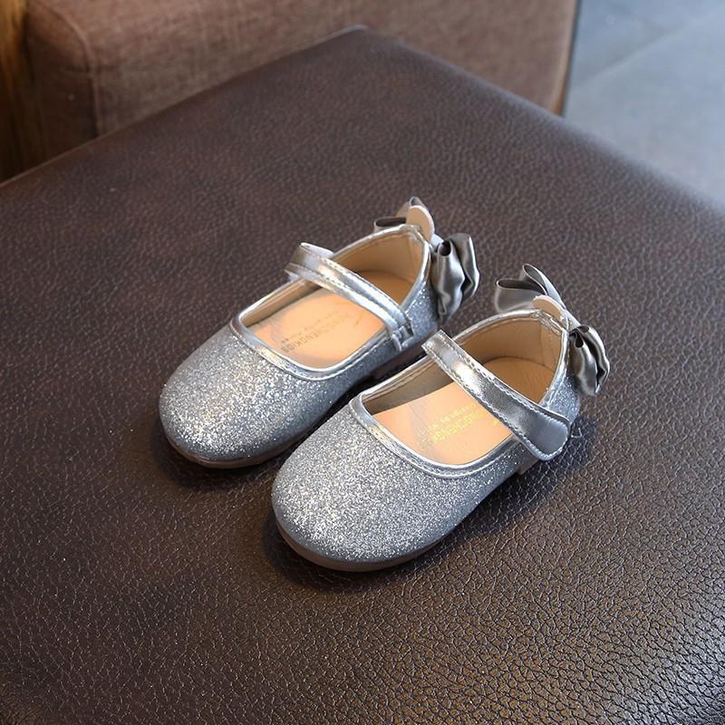 Đôi giày da PU đính nơ kim tuyến cho bé