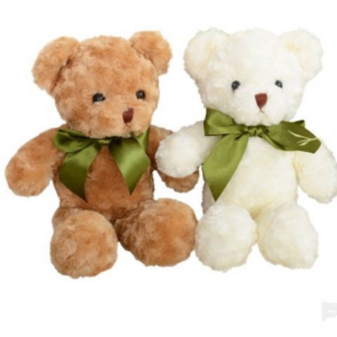 Gấu Teddy nhồi bông màu trắng thắt nơ đáng yêu