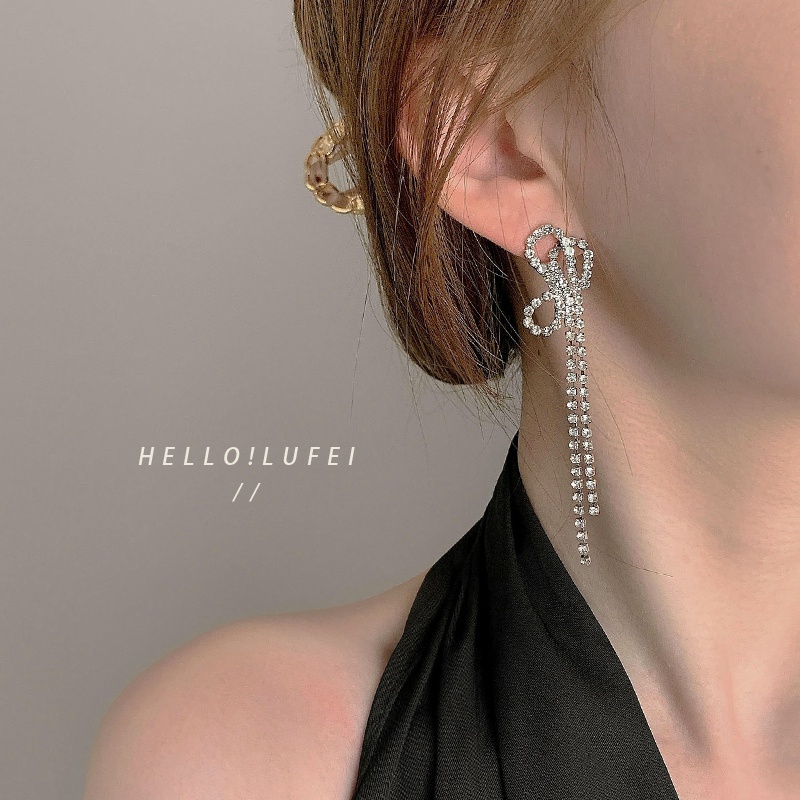 Bông tai nữ dáng dài hình nơ thả tua rua đính đá thời trang 2023