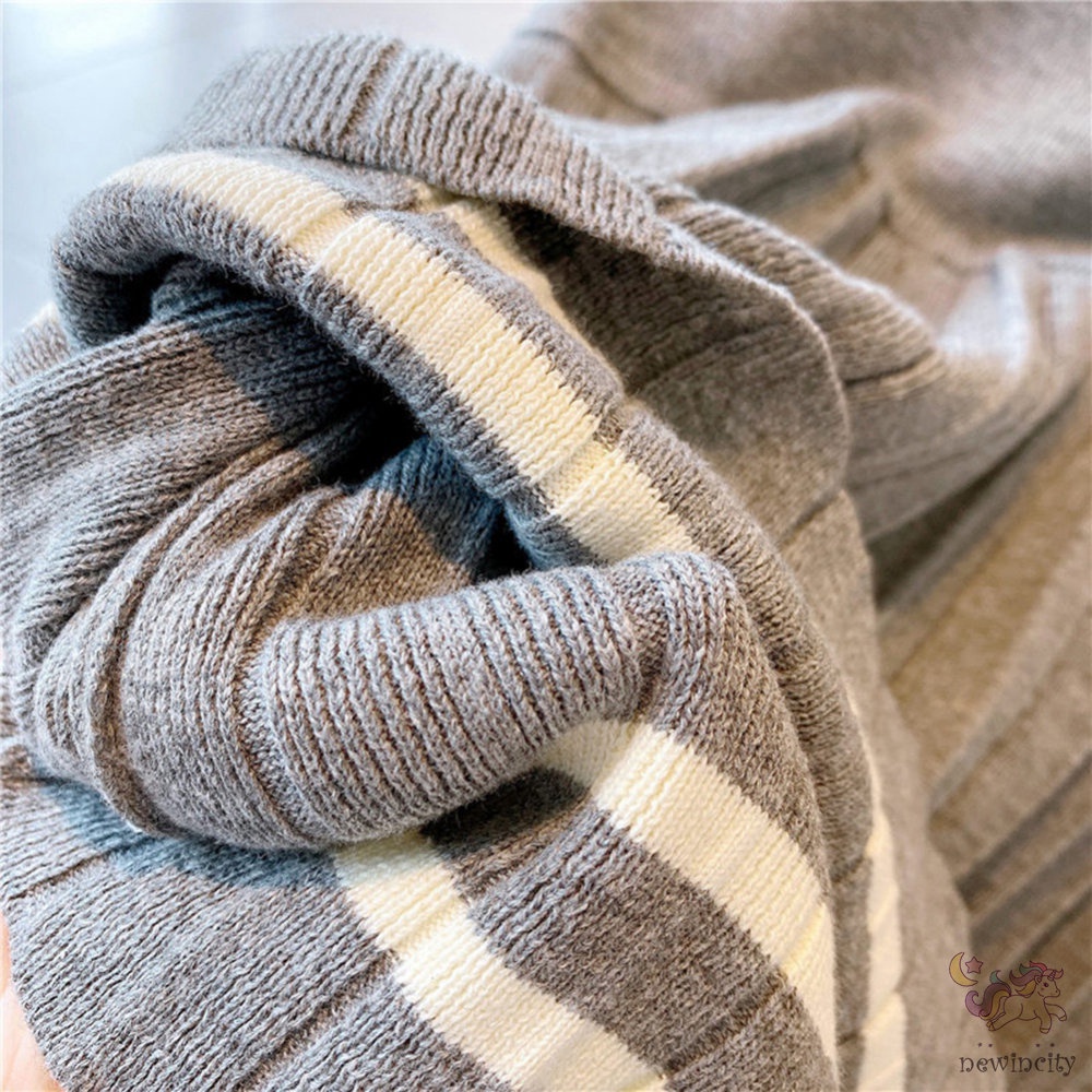 Đầm dài tay phối bèo nhún cho bé