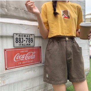 Quần shorts thêu hoa cúc
