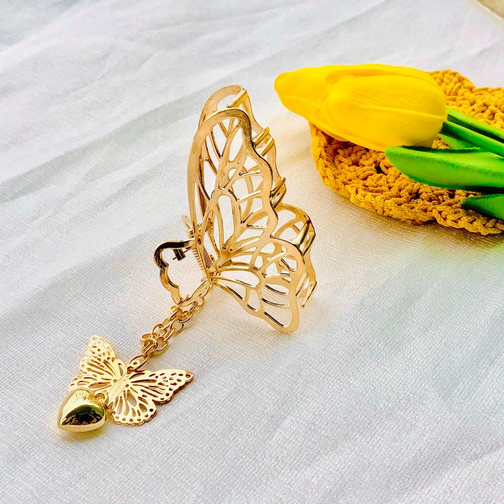 Kẹp tóc càng cua hình bướm gắn dây tua rua phong cách Hàn Quốc dành cho nữ.