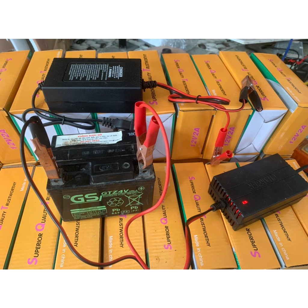 Sạc bình ăc quy axit khô nước 12V2Ah cho xe máy tự ngắt khi đầy sạc cho bình dl từ 4ah -20ah chống chập chống ngược cực.
