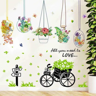 Decal dán tường giỏ hoa xinh kết hợp xe đạp xanh