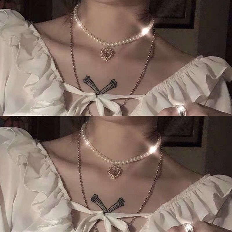 [Mã FAMAYFA giảm 10K đơn 50K] Vòng cổ choker chuỗi ngọc trai nhân tạo mặt trái tim (DCCN06)