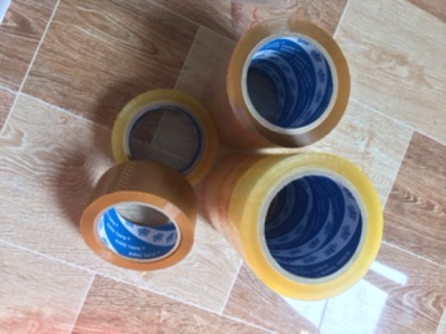 1 cuộn băng keo 100YA ,200gr trong hoặc đục