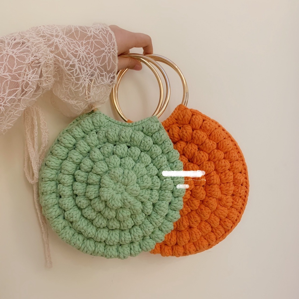 Quai túi xách kim loại hình tròn