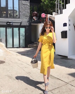 Đầm vàng cột eo