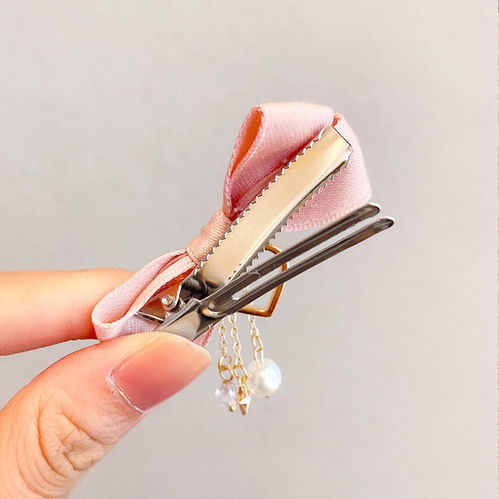 Kẹp Tóc Đuôi Ngựa Hình Nơ Lấp Lánh Cho Nữ