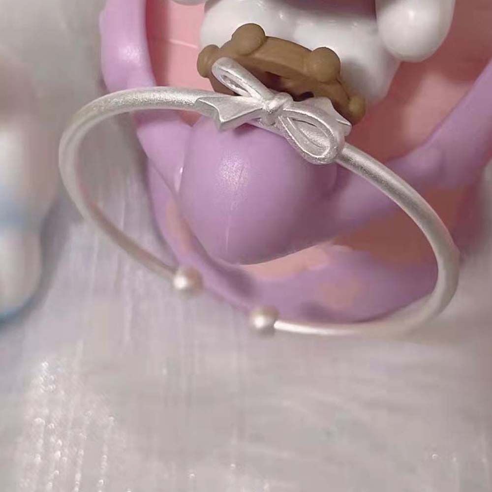 Vòng đeo tay dạng hở chữ C mặt nơ đính chuông phong cách Hàn Quốc màu sắc đáng yêu dành cho nữ