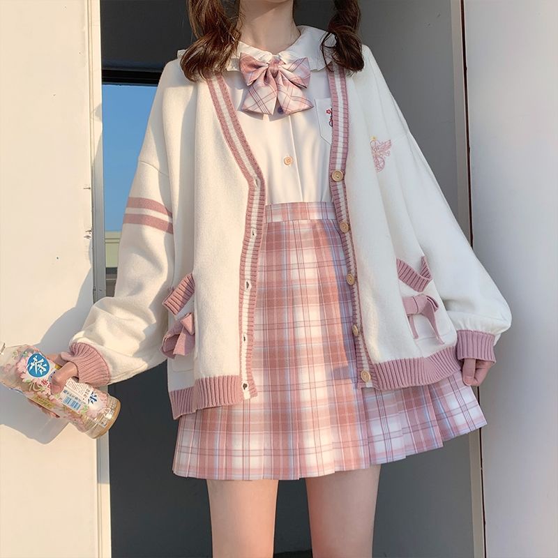 Bộ Áo Sweater Dệt Kim Đính Nơ + Chân Váy Xếp Ly Nữ Tính