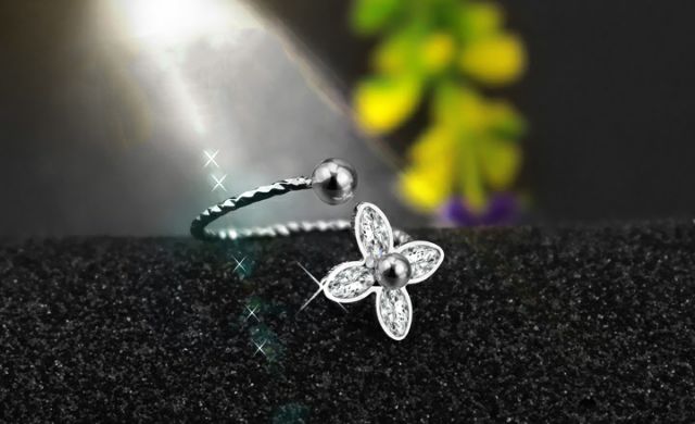 Nhẫn nữ inox hoa mai free size