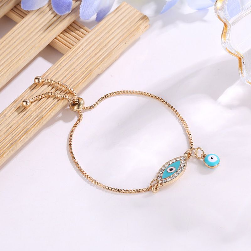 Vòng Tay May Mắn Đính Đá Mắt Quỷ Màu Xanh