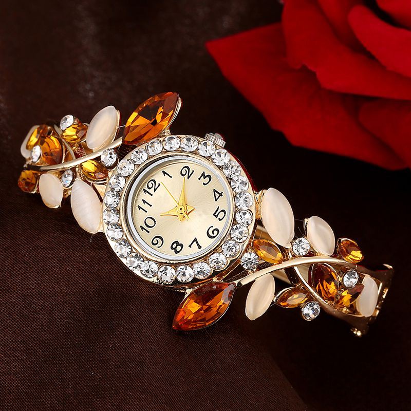 Đồng hồ Quartz dạng lắc tay rỗng đính pha lê đá quý nhiều màu cho nữ
