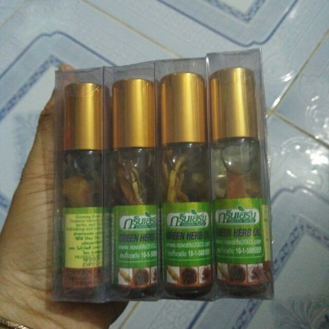 Dầu lăn sâm Thái Lan. Chuyên trị nhức đầu, đau bụng, say tàu xe,....chai có dung tích 8cc, rất thuận tiện cho khách ....
