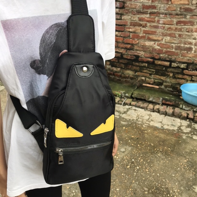 Túi đeo chéo mắt vàng | BigBuy360 - bigbuy360.vn